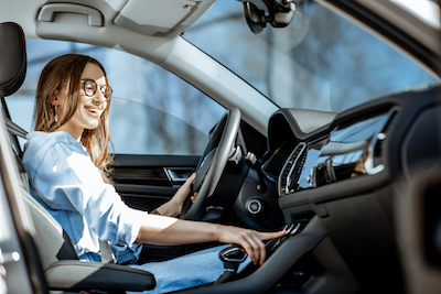 woman driving car after ADAS calibration