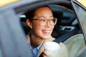 woman looking through car power window